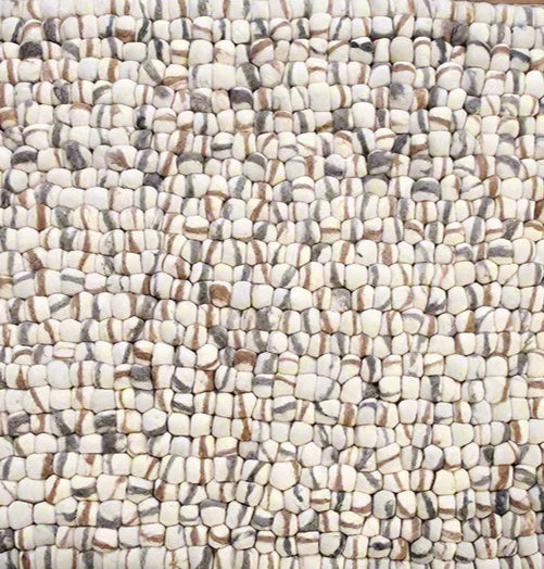 Wool felt pebble rug with textured design