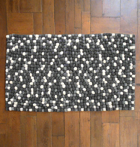 Wool felt pebble rug with textured design