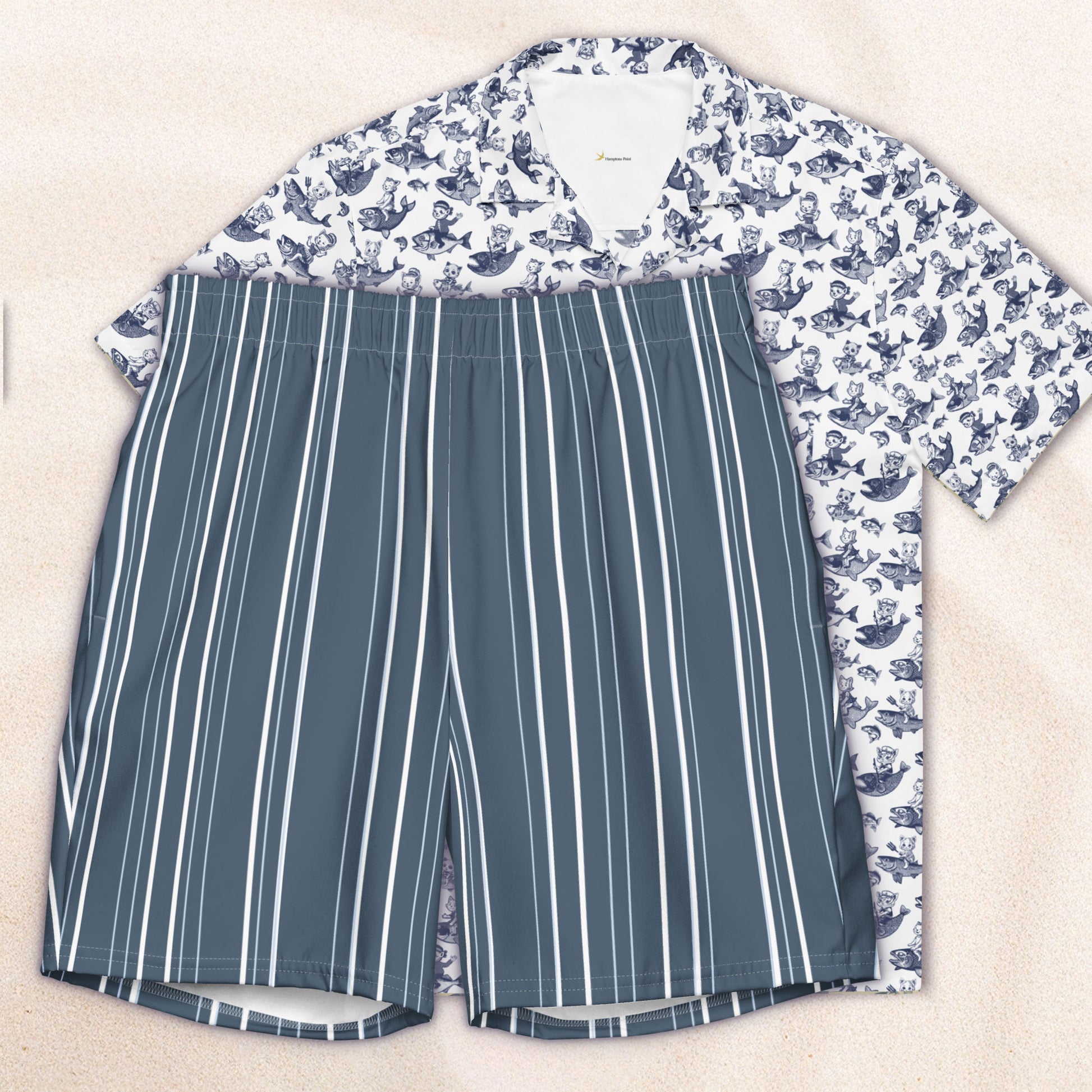 Shorts with a blue and white striped pattern and a floral shirt on a beige background