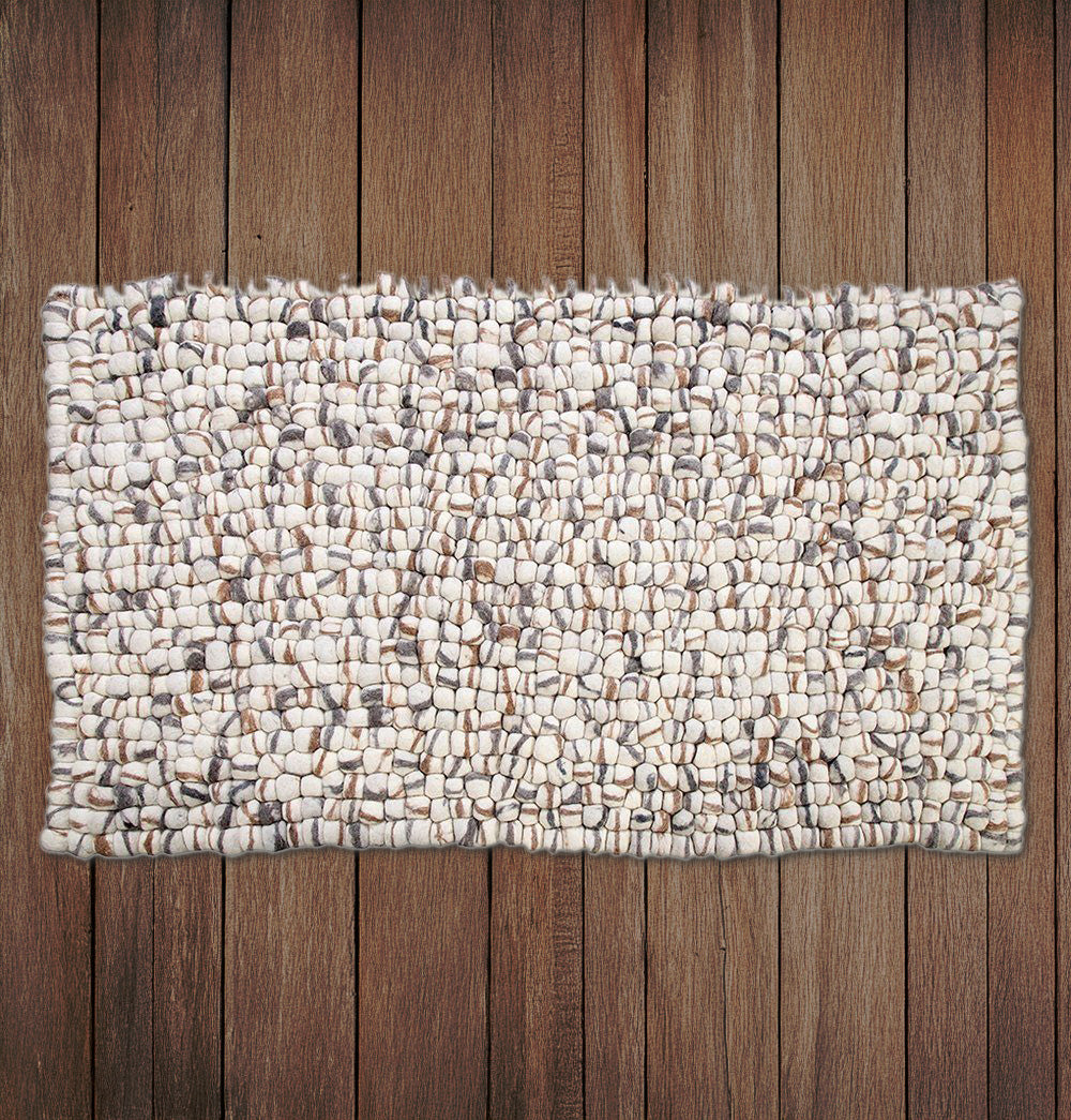 Wool felt pebble rug with textured design