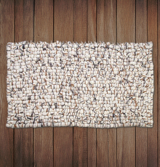 Wool felt pebble rug with textured design